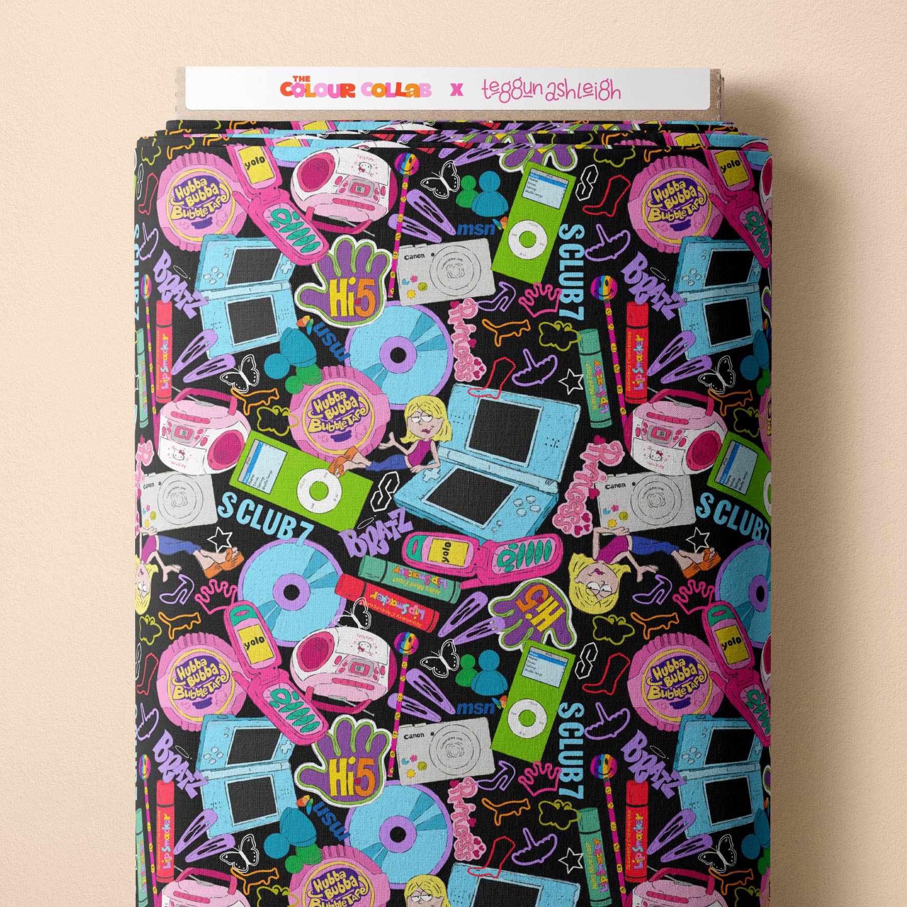 00s Mash Up (Black) fabric by The Colour Collab mock up on fabric bolt