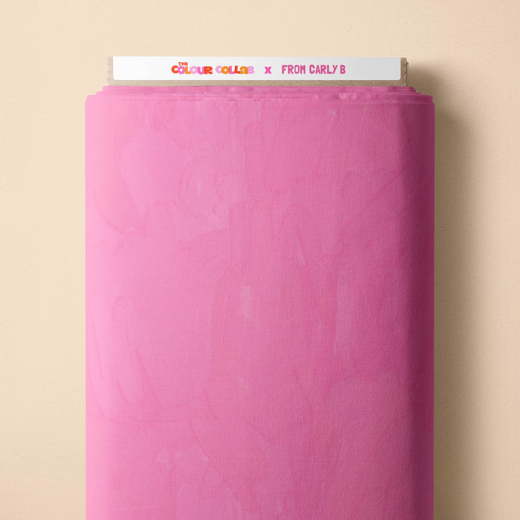 Plain Colour (Bubblegum) fabric by Carly B mock up on fabric bolt
