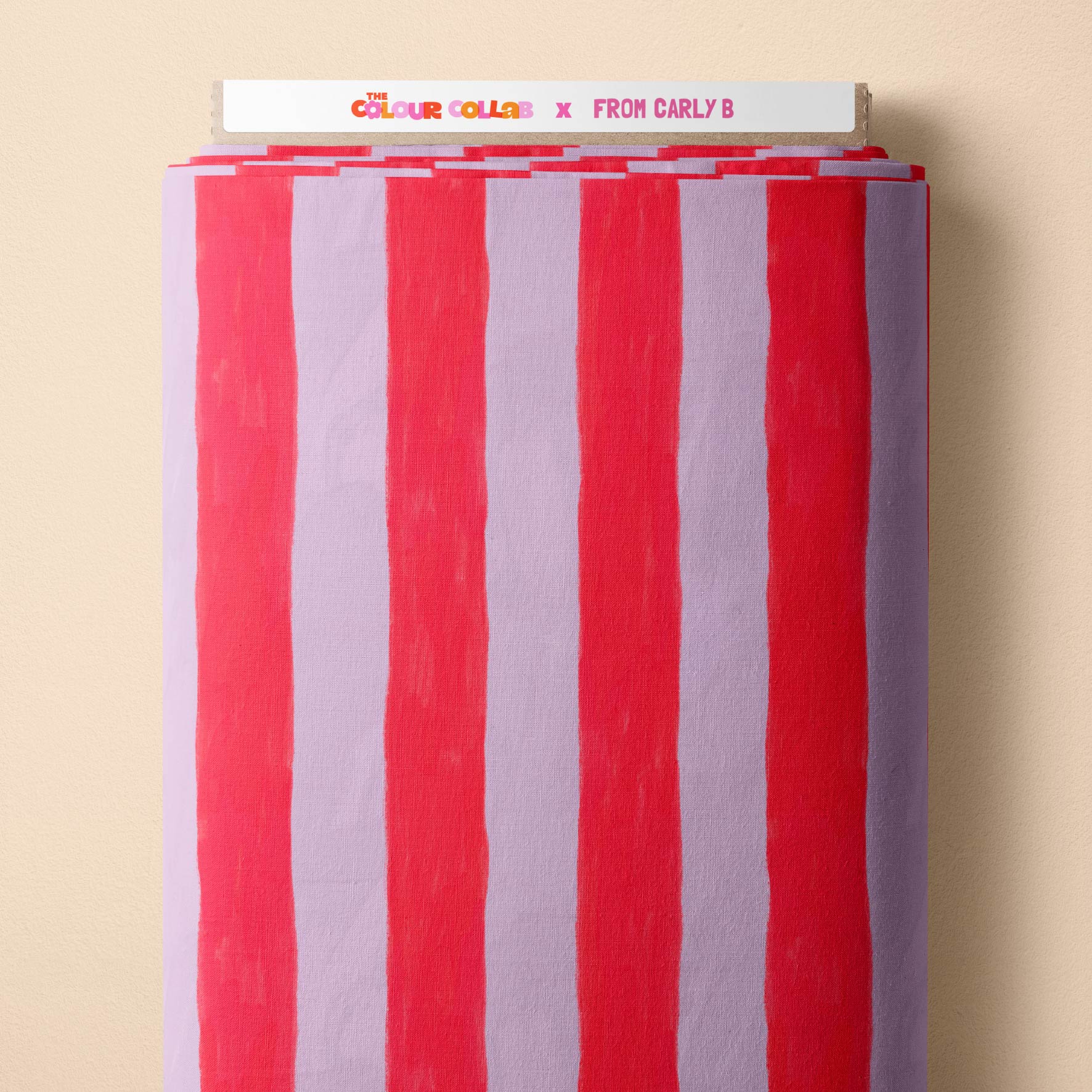 Darling Stripes (Watermelon & Launa) fabric by Carly B mock up on fabric bolt