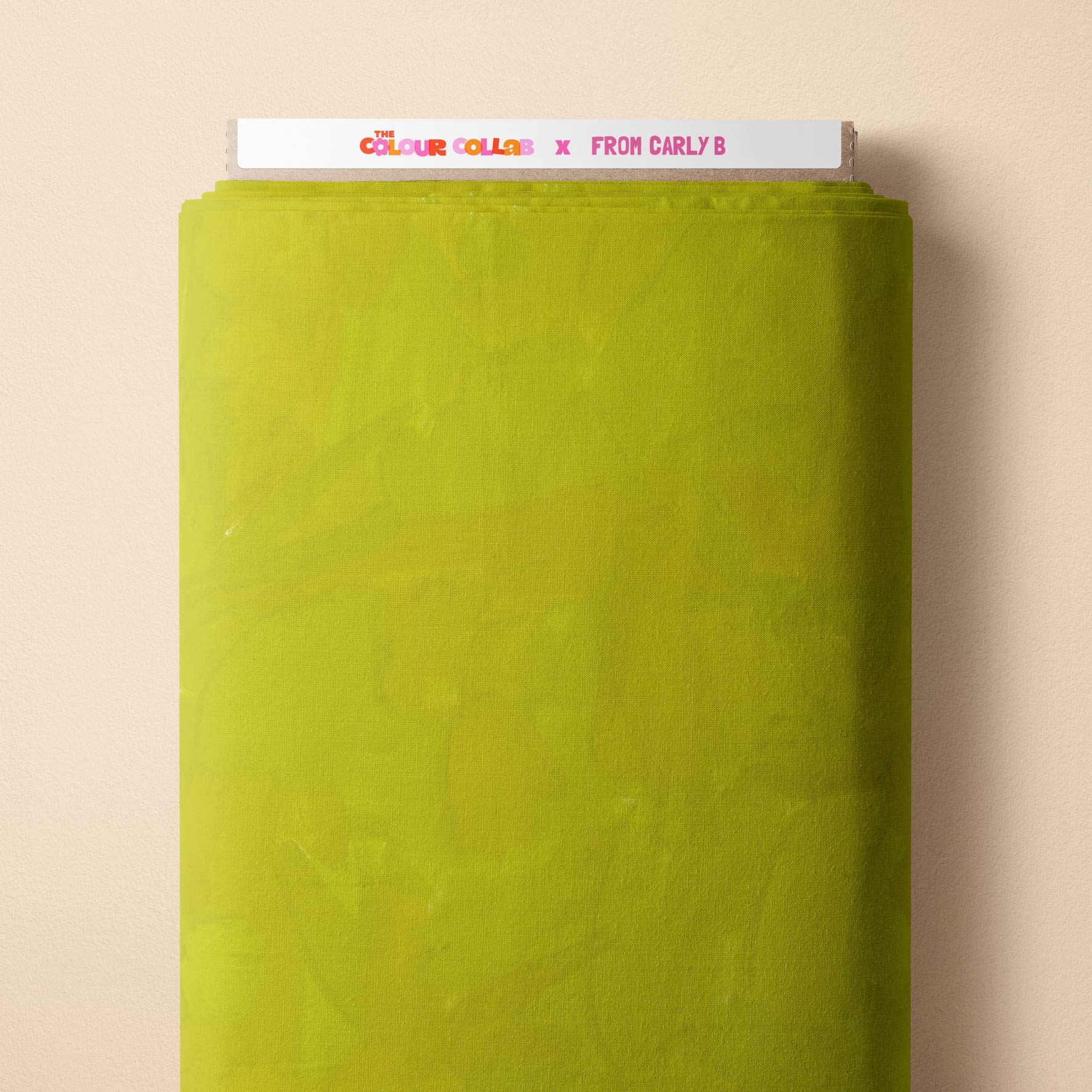 Plain Colour (Grass) fabric by Carly B mock up on fabric bolt