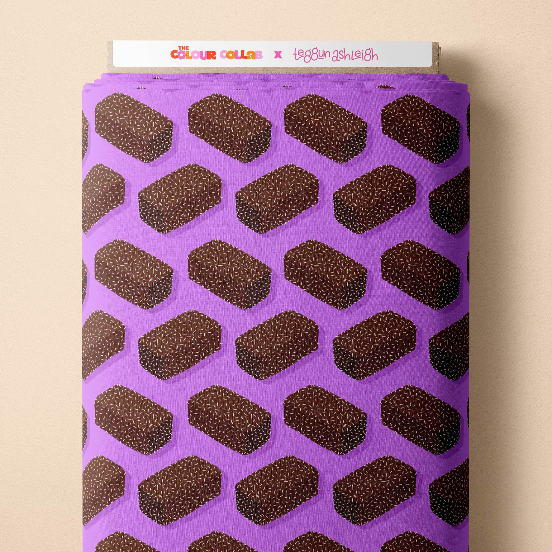 Lamingtons (Purple) fabric by The Colour Collab mock up on fabric bolt