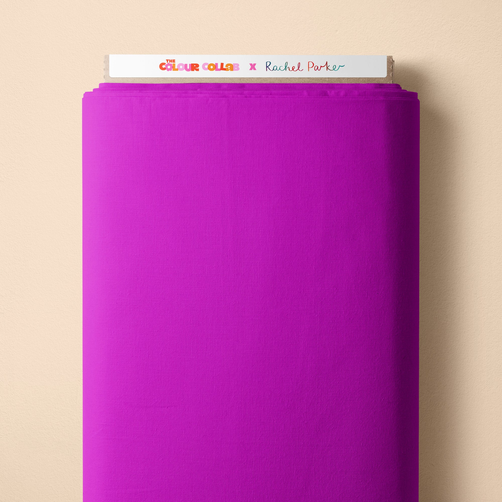 Plain Colour - Brightside (Magenta) fabric by The Colour Collab mock up on fabric bolt