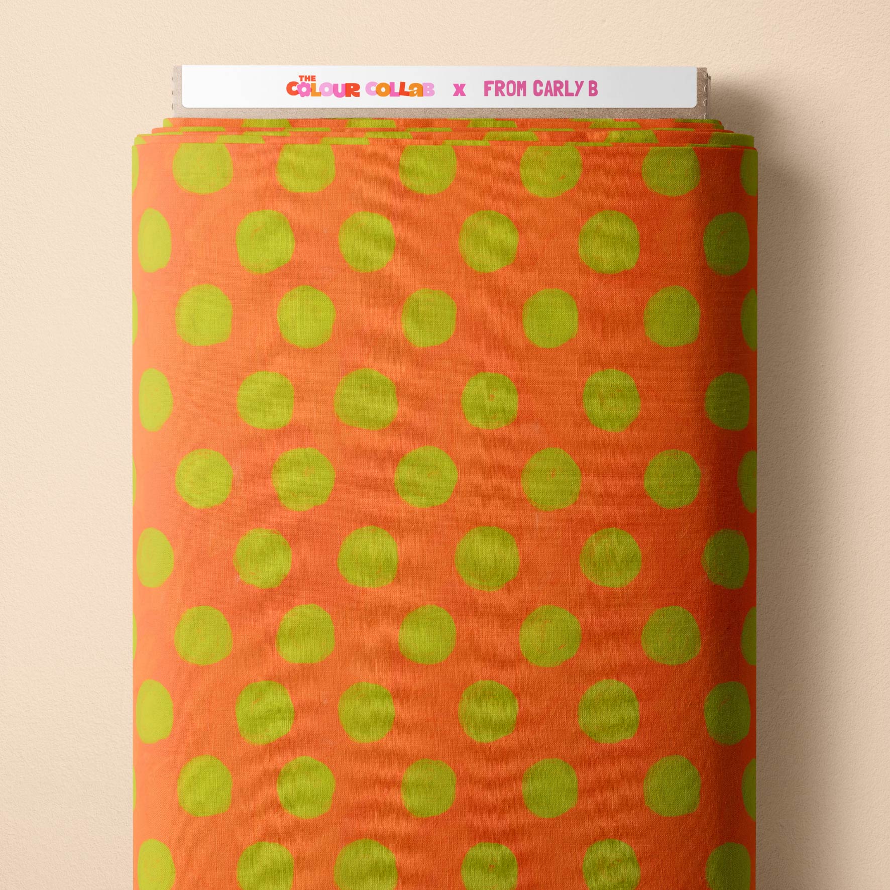 Silly Billy Polka Dots (Smartie & Grass) fabric by Carly B mock up on fabric bolt