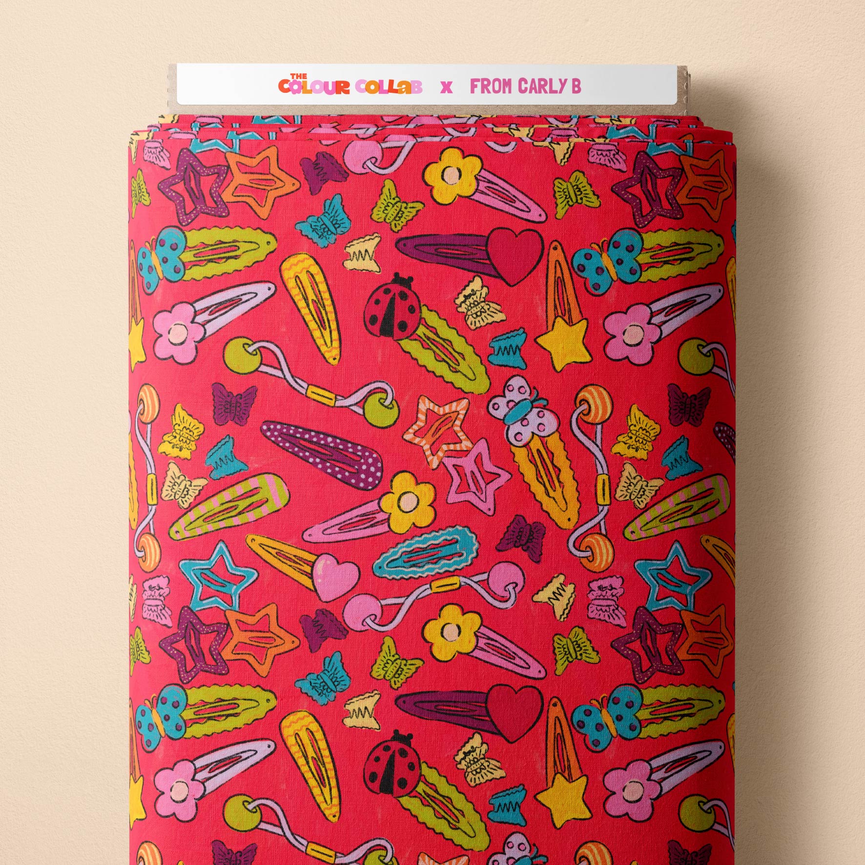 Sweet Pea (Watermelon) fabric by Carly B mock up on fabric bolt