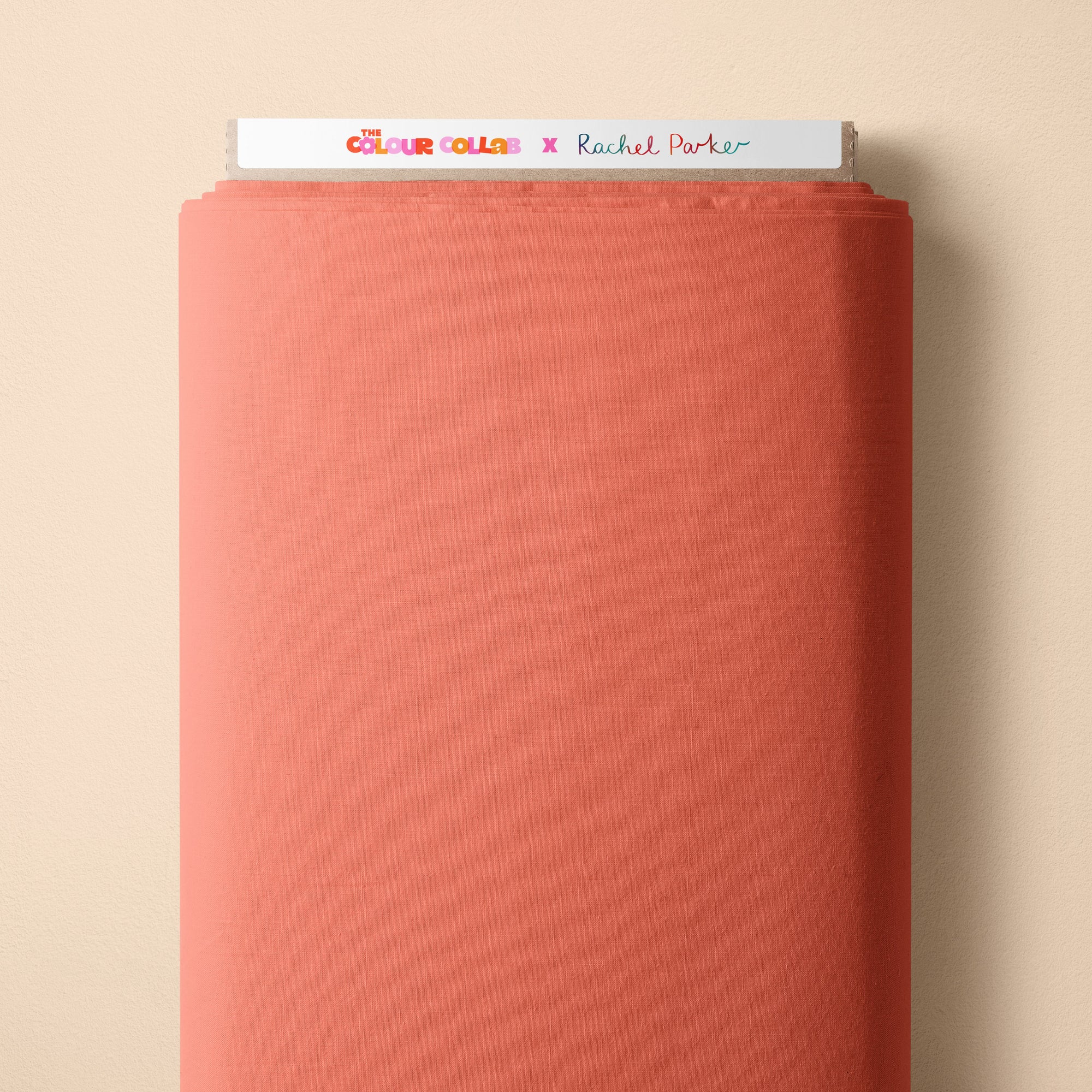 Plain Colour - Brightside (Tangerine) fabric by The Colour Collab mock up on fabric bolt