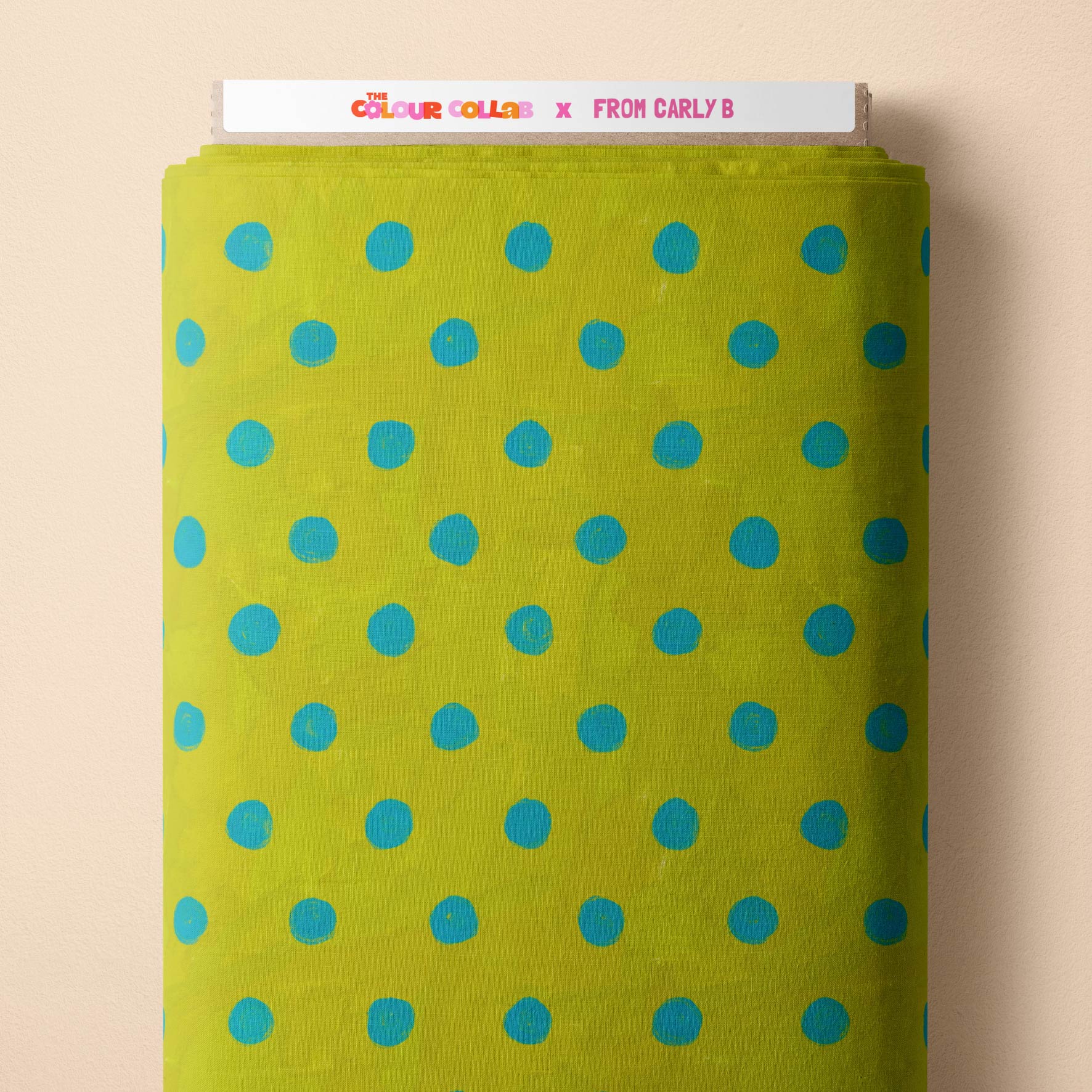 Teeny Tiny Polka Dots (Blue & Grass) fabric by Carly B mock up on fabric bolt