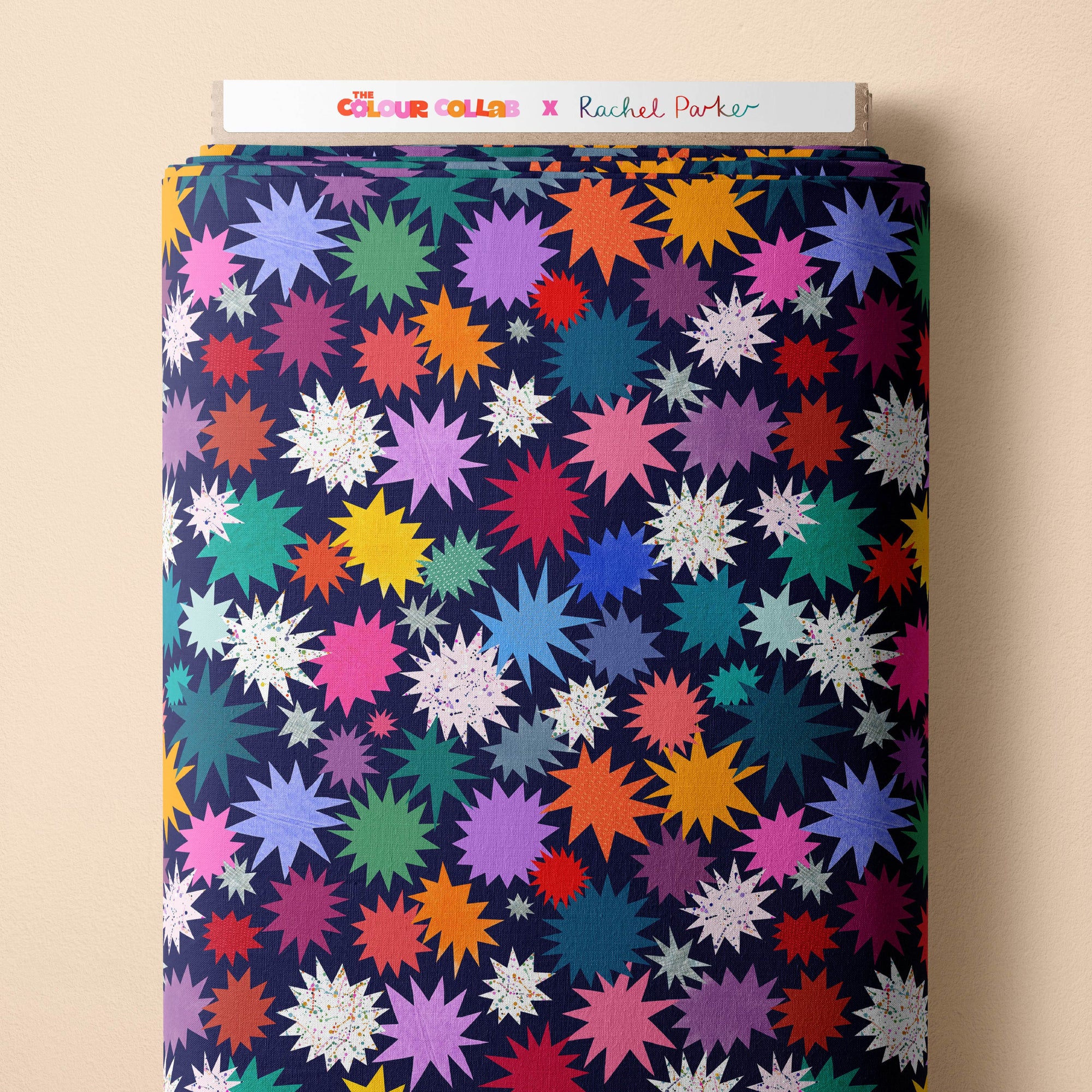 Twinkle (Navy) fabric by Rachel Parker mock up on fabric bolt