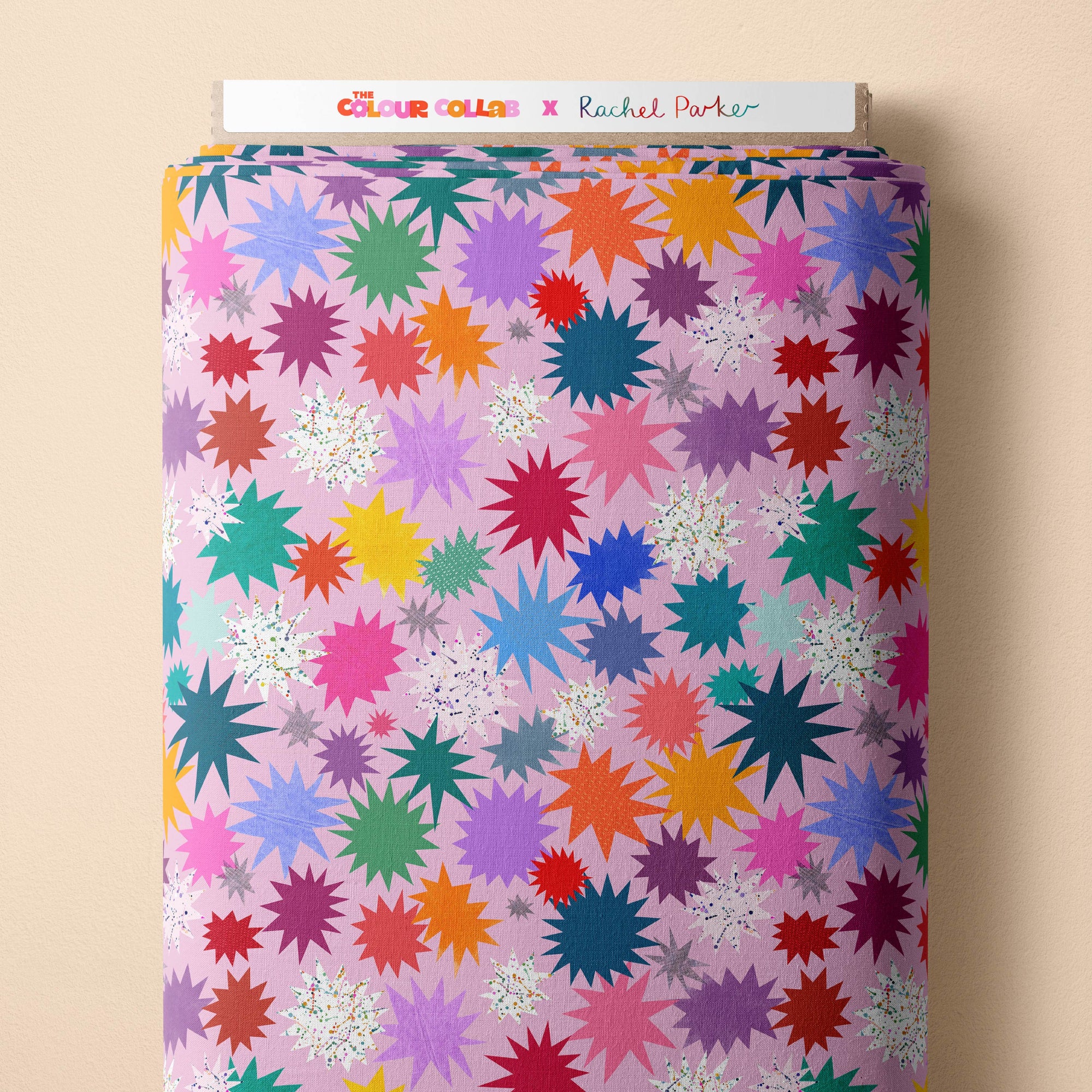 Twinkle (Rose) fabric by Rachel Parker mock up on fabric bolt